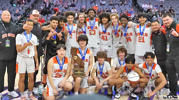 Athenian School boys basketball team celebrating a CIF Championship win.