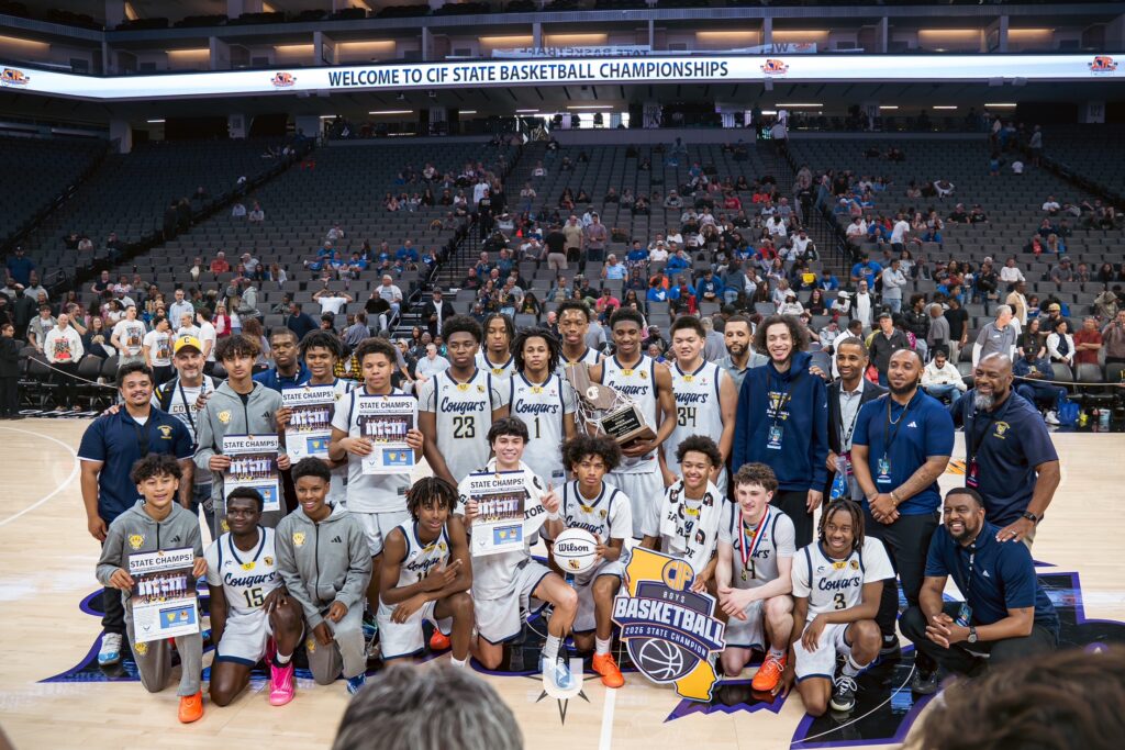 Cornerstone Christian boys basketball team celebrating a CIF State Championship win.